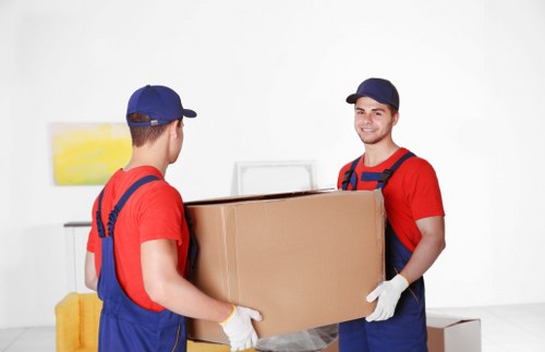 Furniture and boxes being loaded carefully into a van for a Belgravia move